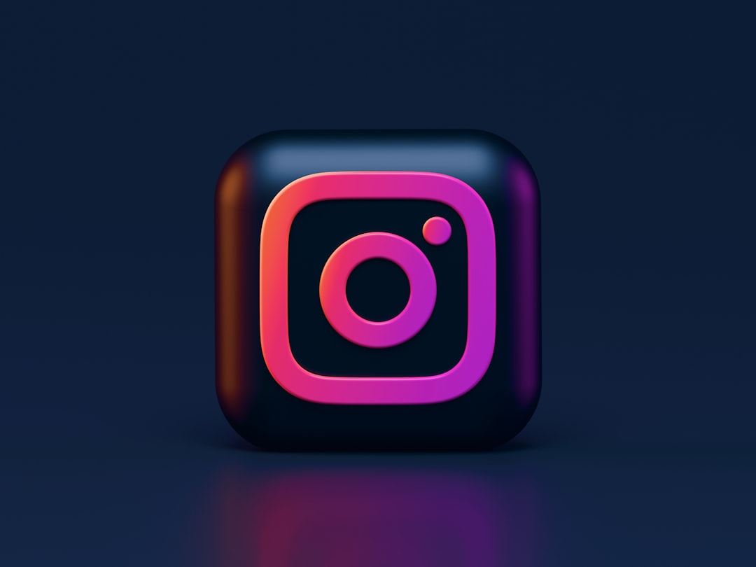 Content creator planning Instagram posts on phone and notebook